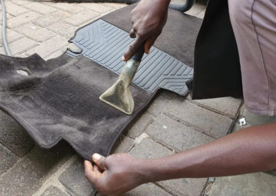 Steam cleaning vehicle carpets
